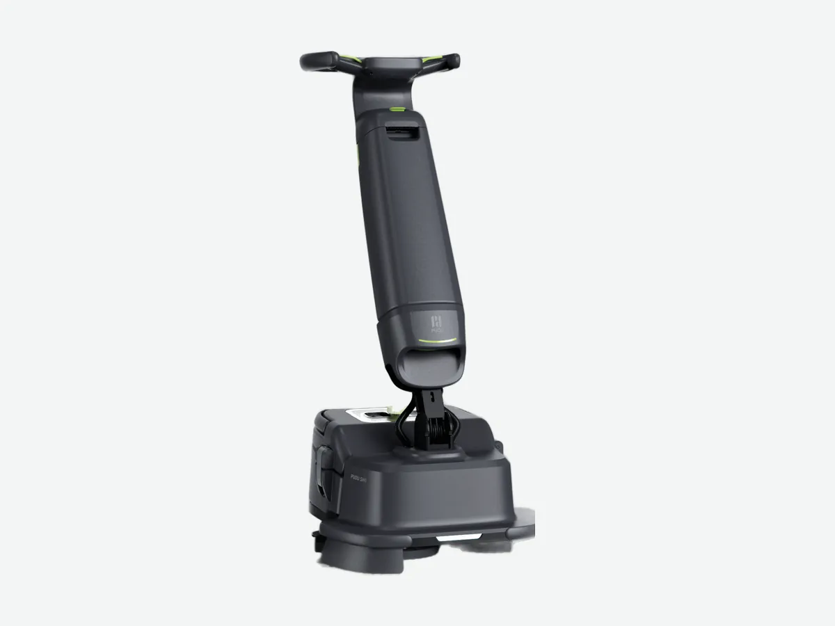 Smart upright scrubber-dryer with tall control column and compact cleaning base
